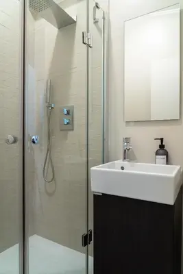 a bathroom with a sink and a shower at alPigneto Apartment Rome in Rome