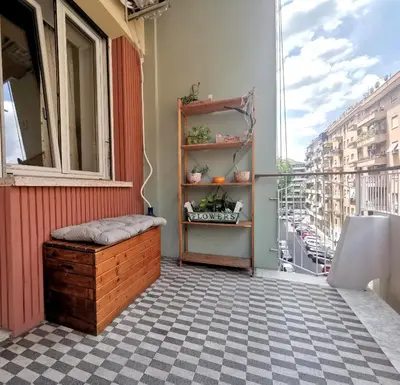 a balcony with a bench and a window at Cipro Home in Rome