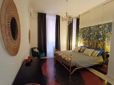 a bedroom with a bed in a room at Design House Monti in Rome