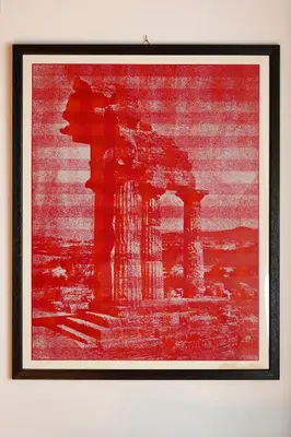 a framed picture of a painting of a monument at Views of the Coliseum in Rome