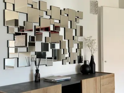 a wall art made out of photographs on a wall at Lumen House - Attico con Suite in Rome