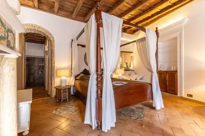 a living room with a couch and a table at Navona Historic Lovely Flat in Rome