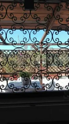 a view of a window with a wrought iron fence at Terrazza di Antonio in Rome