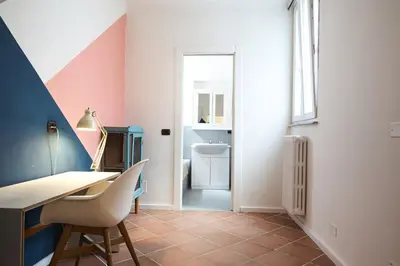 a home office with a desk and a chair at Casa Lucrezia in Rome