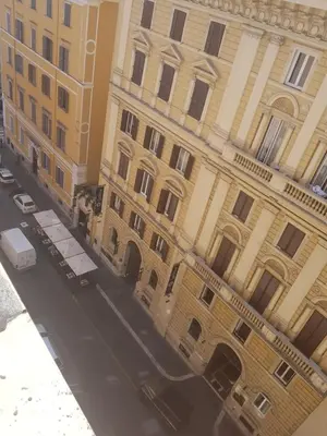 an overhead view of a street in front of a building at Pitagora House in Rome