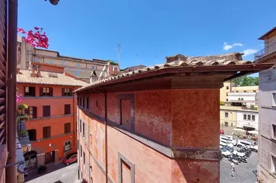 a view of the roof of a building at Magical Navona Duplex With Terrace by Halldis in Rome