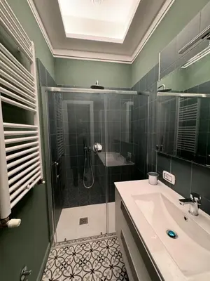 a bathroom with a shower and a sink at Vaticano Roma Guesthouse in Rome