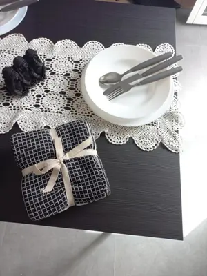 a table with a plate and a fork and knife at Viktoria's Suite Rome Center in Rome