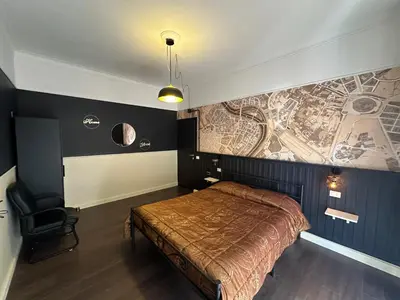 a room with a wooden table and some chairs at D-Place Cozy Comfy Relaxing House in Rome in Rome