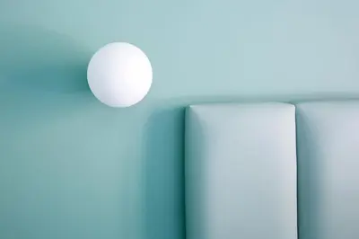 a white ball on the wall in a room at Luciano Queen's Guest House in Rome