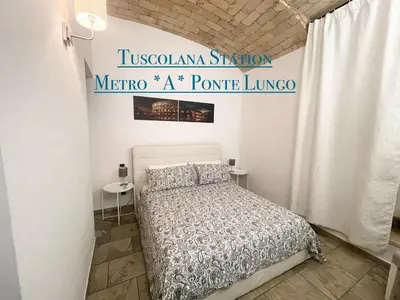 a bathroom with a toilet and a sink at Casa Metro A PONTELUNGO in Rome