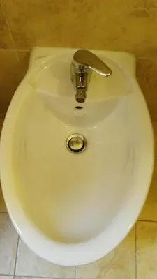 a close up of a toilet in a bathroom at Piccolo Nido in Rome