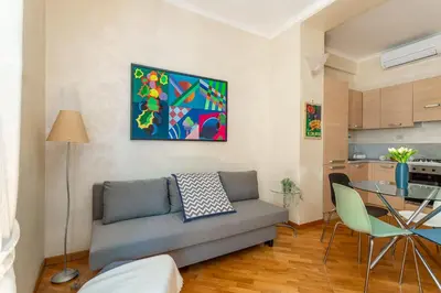 a living room with a couch and a table at iFlat Bright & Comfortable Navona apartment in Rome