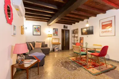 a living room with a couch and a table at Dolce Far Niente in Rome