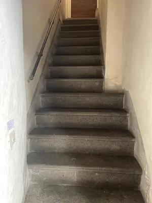 a staircase in a building with a stair case at Giglio apartment Navona in Rome