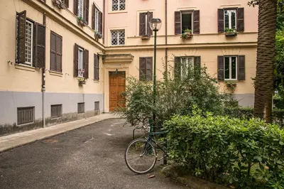 a bike parked in front of a building at Esa apartment Flaminio in Rome