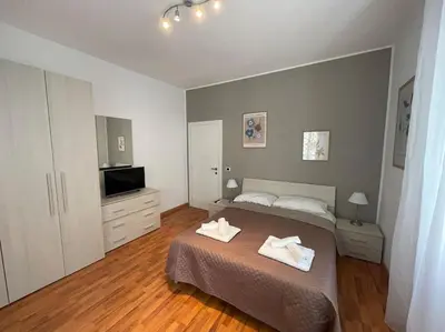 a bedroom with a bed with two towels on it at Interno 3 - Vatican Apartment in Rome