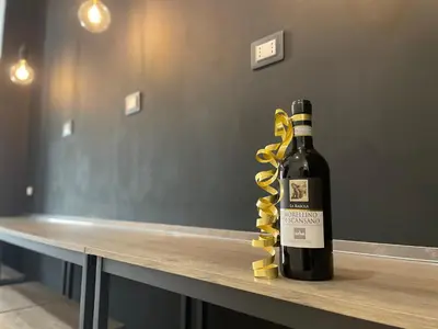 a bottle of wine sitting on a table at Wow Rome Home in Rome