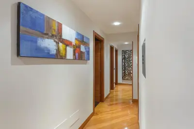 a hallway of a house with a painting on the wall at Rome Guest House Saint Peter in Rome