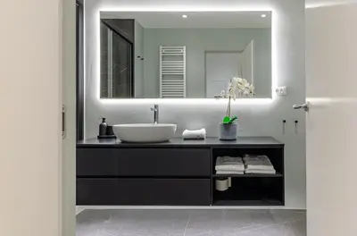 a bathroom with a sink and a mirror at Domus Beato Angelico in Rome