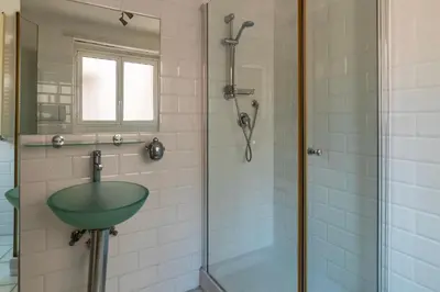 a bathroom with a sink and a shower at Cappellari 4 - FromHometoRome in Rome