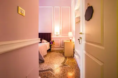 a sign that says marriage hanging on a wall at Hold Rome - Luxury Suites in Rome