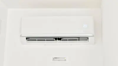 a white stove top oven sitting in a kitchen at Centro Solferino Rooms in Rome