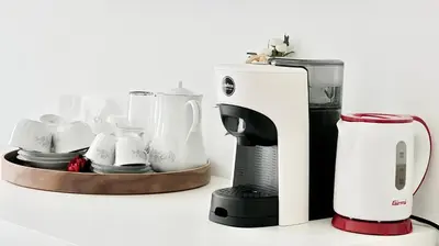 a coffee maker and a mixer on a counter at Centro Solferino Rooms in Rome