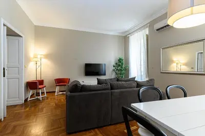 a living room with a couch and a tv at Comfortable & Cozy by NDP rent in Rome
