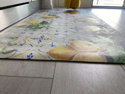 a rug on the floor of a room with a floor at Dany & Manu House in Rome