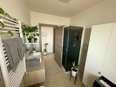 a bathroom with a shower and a sink at GreenChill House - West Rome in Rome