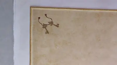 a framed picture of a cross on a wall at Vatican Mamma Roma in Rome