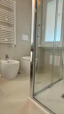 a bathroom with a shower and a sink and a toilet at Vatican Lovely Nights-Luxury Rooms in Rome