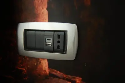 a white switch on a wall at Vacanze Romane Vaticano in Rome