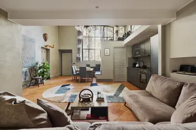 a living room with a couch and a table at Margutta Exclusive Apartment by Romeloft in Rome
