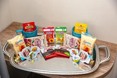 a tray filled with snacks on a table at Perla al Pigneto Bed and Breakfast Roma in Rome