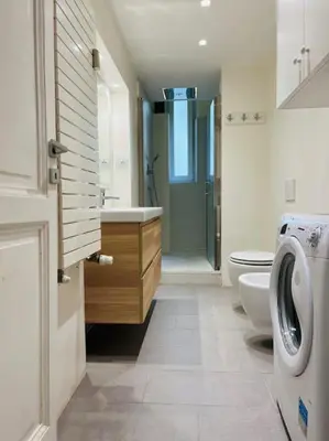 a bathroom with a toilet and a sink and a shower at Anna Rome Vatican Luxury in Rome