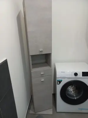 a washer and dryer in a small room at Andrew's Suite Rome center in Rome