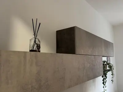 a concrete wall with a vase on top of it at House Garden 44 - 15 minutes from Vatican Museums in Rome