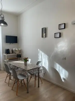 a dining room with a table and chairs at Enjoy Rhome in Rome