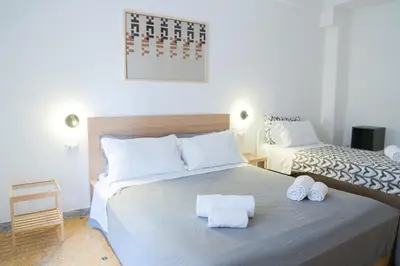 a bedroom with a bed with towels on it at VaticaNella 10 min walk from Vatican Museums in Rome