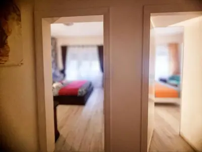 an open door to a room with a living room at Rome Castle&Dome in Rome
