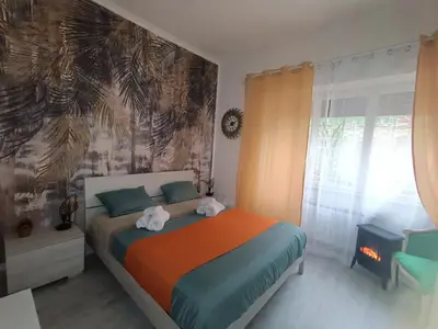 a bedroom with a bed with two stuffed animals on it at Rome Castle&Dome in Rome