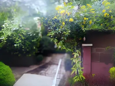 a garden with a red door and yellow flowers at Rome Castle&Dome in Rome