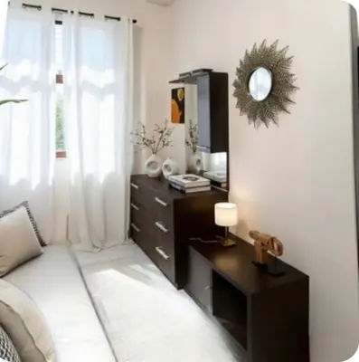 a living room with a dresser and a mirror at Rome Castle&Dome in Rome