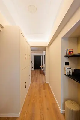 an attic hallway with a skylight and a ceiling at Casa Scipioni by Hili in Rome