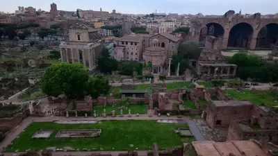 an aerial view of the colosseum and the roman ruins at Charming Apartment Near Roman Forum - 60 m² in Rome