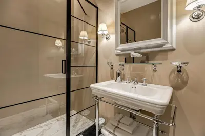 a bathroom with a sink and a mirror and a shower at BDC - Luxurylifestyle in Rome