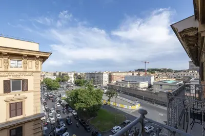 a view of a busy city street with cars at St Peter Twelve in Rome