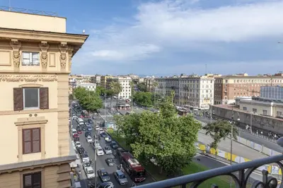 a view of a busy city street with cars at St Peter Twelve in Rome